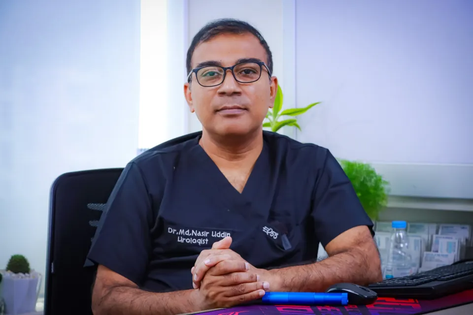 Dr. Md. Nasir Uddin, urology surgeon, in scrubs