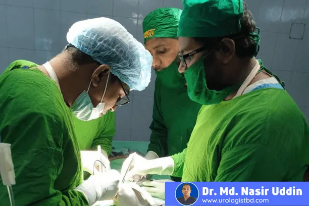 Dr. Md. Nasir Uddin performing surgery with his team